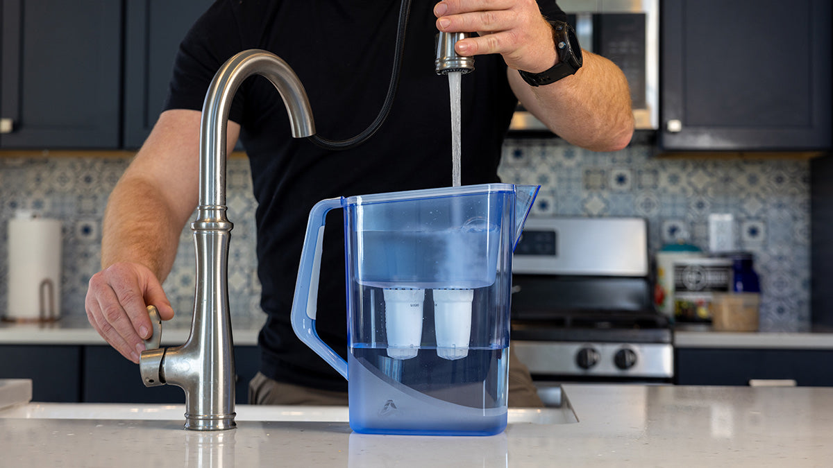 Filling the Alexapure Pitcher Water Filter with water