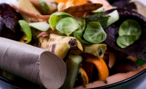 Bits of vegetable, fruits and paper ready for composting.