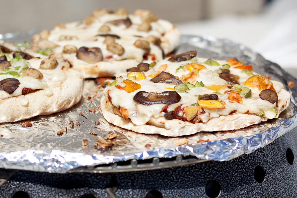 Closeup shot of Pizzas on a Volcano Grill