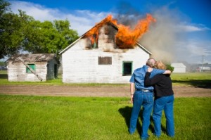 couple and burning house