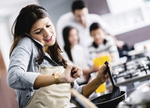 Busy mum cooking at home