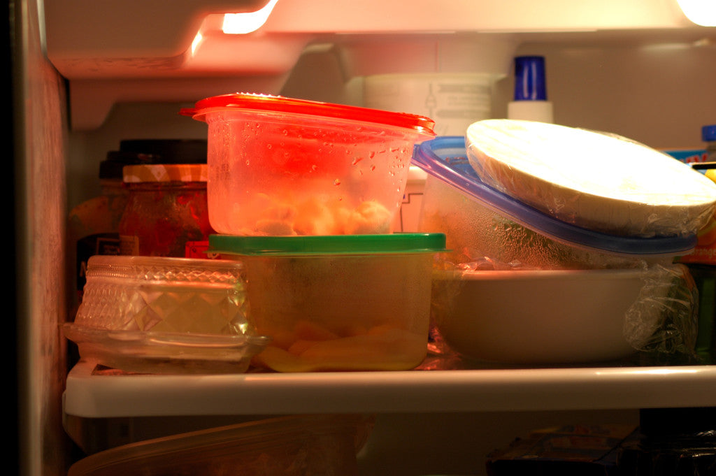 Leftovers stacked in the fridge. Clean Your Refrigerator
