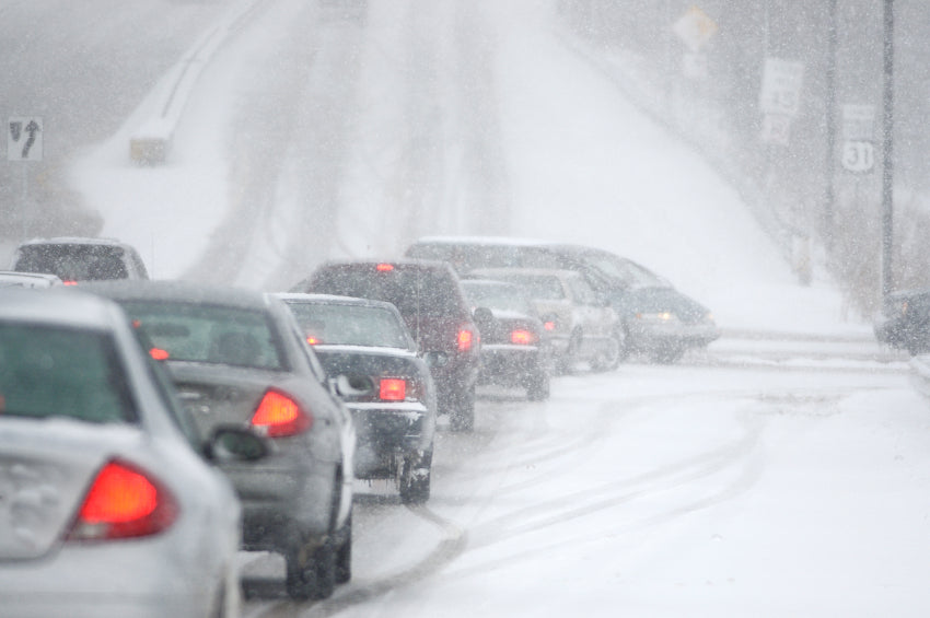 Traffic backed up in the snow