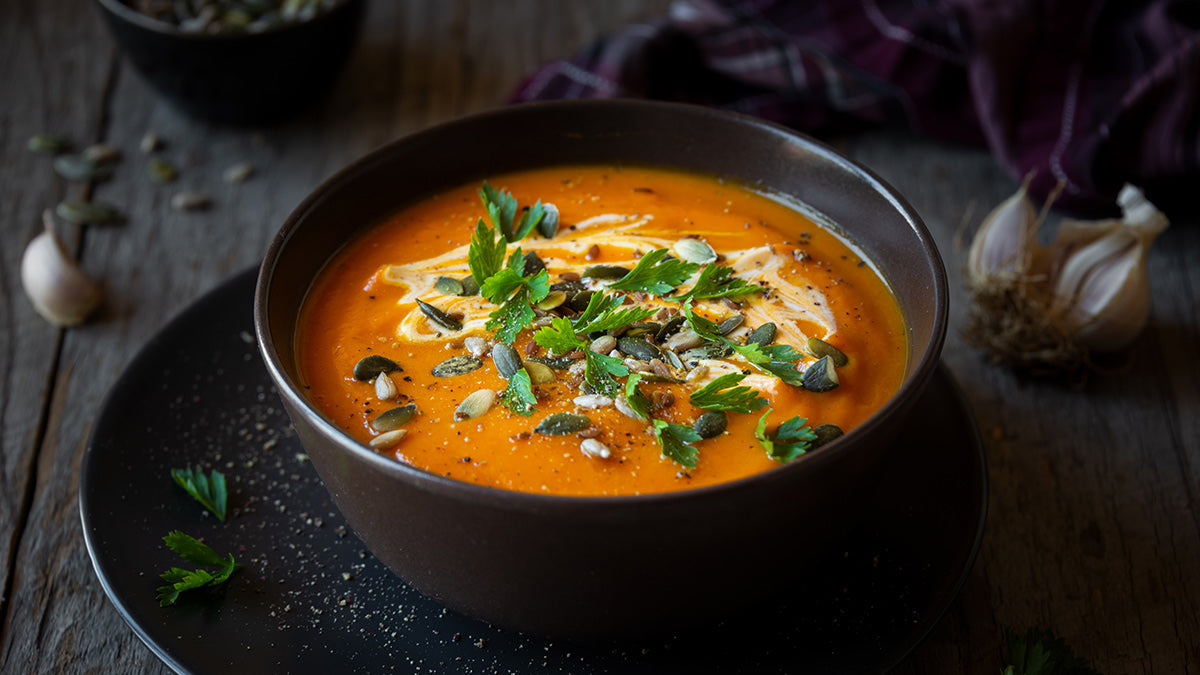 Tomato soup in a dark bowl