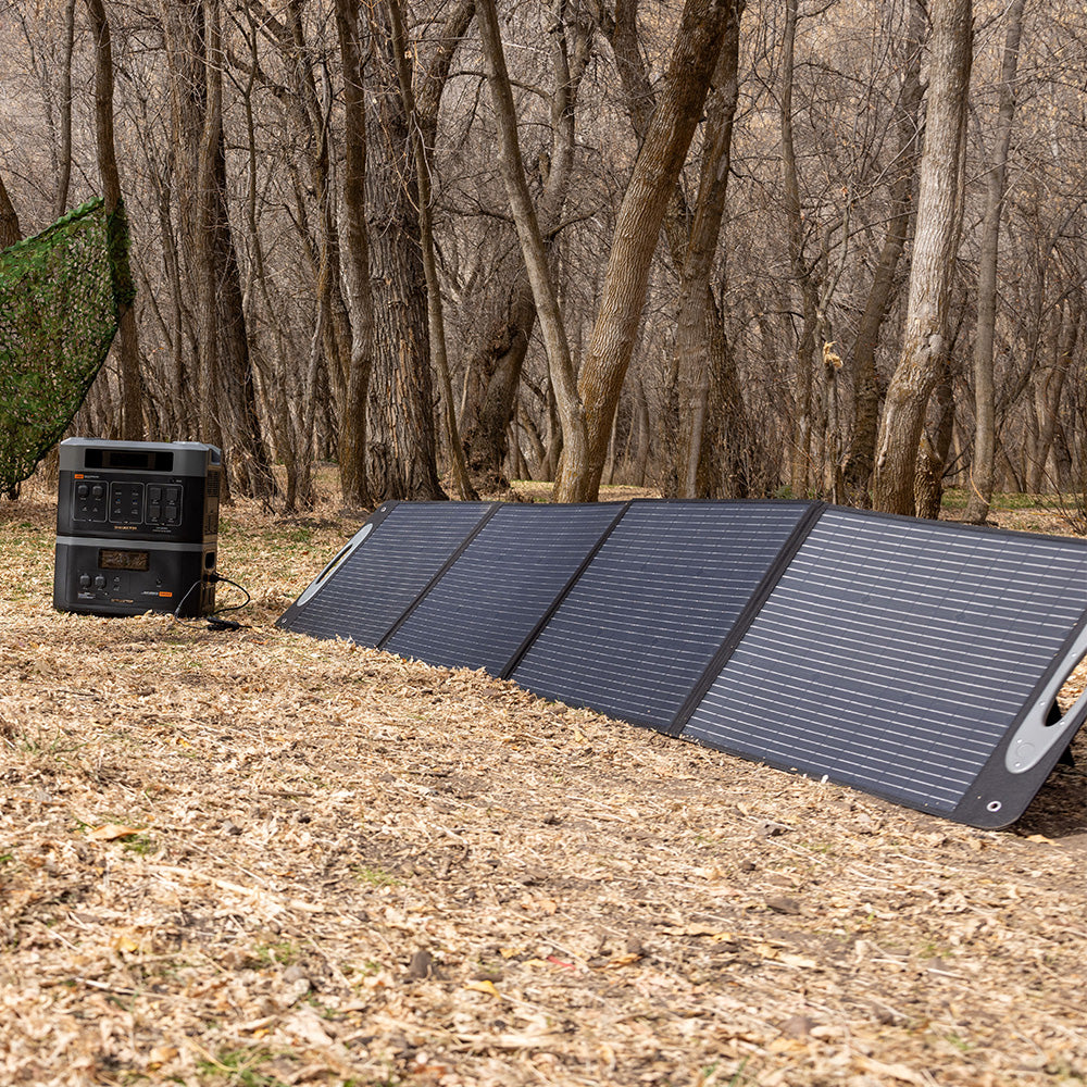Grid Doctor folding solar panels deployed outdoors for off-grid charging