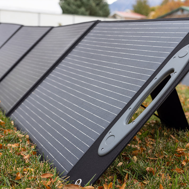 Grid Doctor 200 Watt solar power panel spread out, showcasing the array of efficient solar cells on grass. (7340716949644)