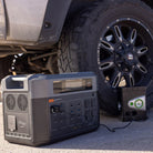 Grid Doctor 3300 portable power station positioned beside a vehicle