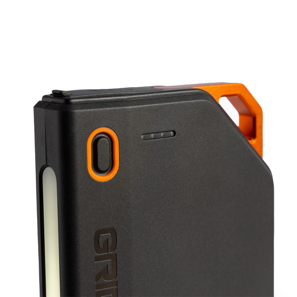 Close-up of Grid Doctor 65W Power Bank power button, battery indicator, and handle