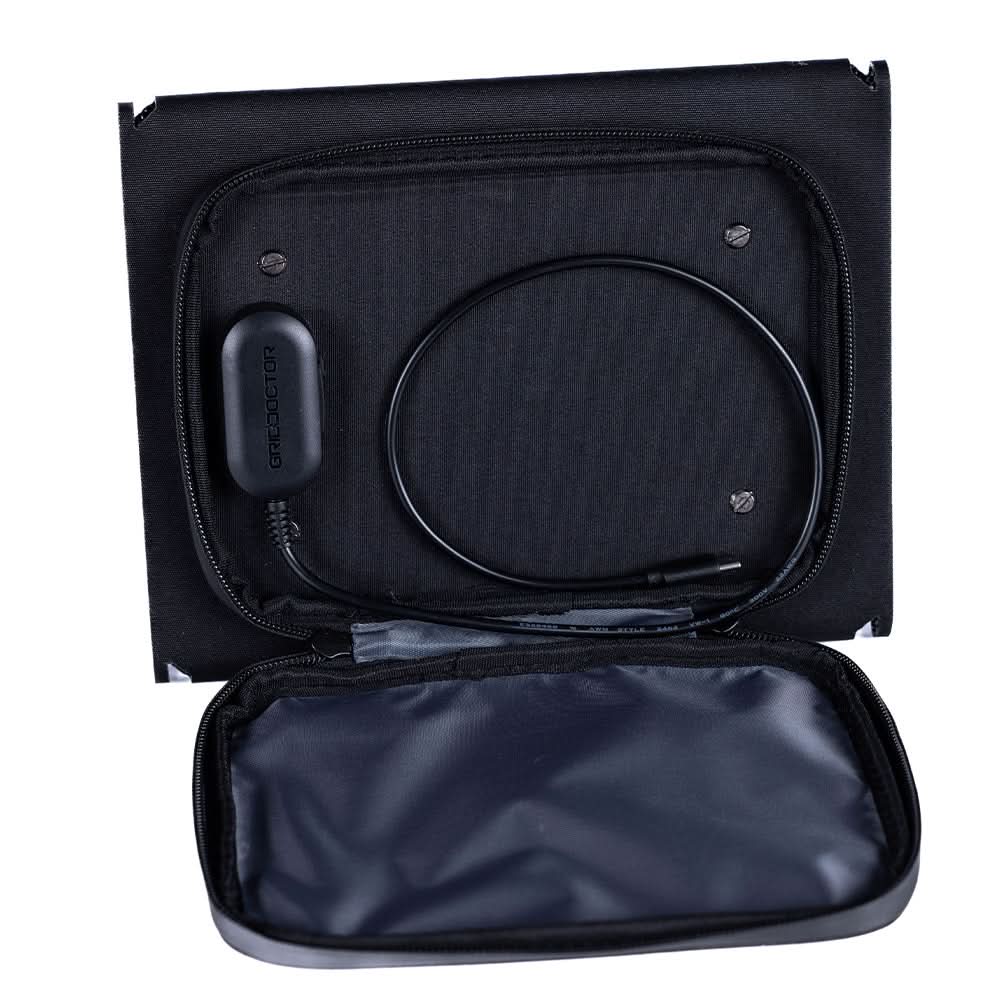 Grid Doctor carrying case with charging cable and accessories inside