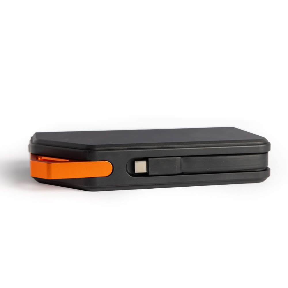 Side view of Grid Doctor 65W Power Bank showing integrated charging cable