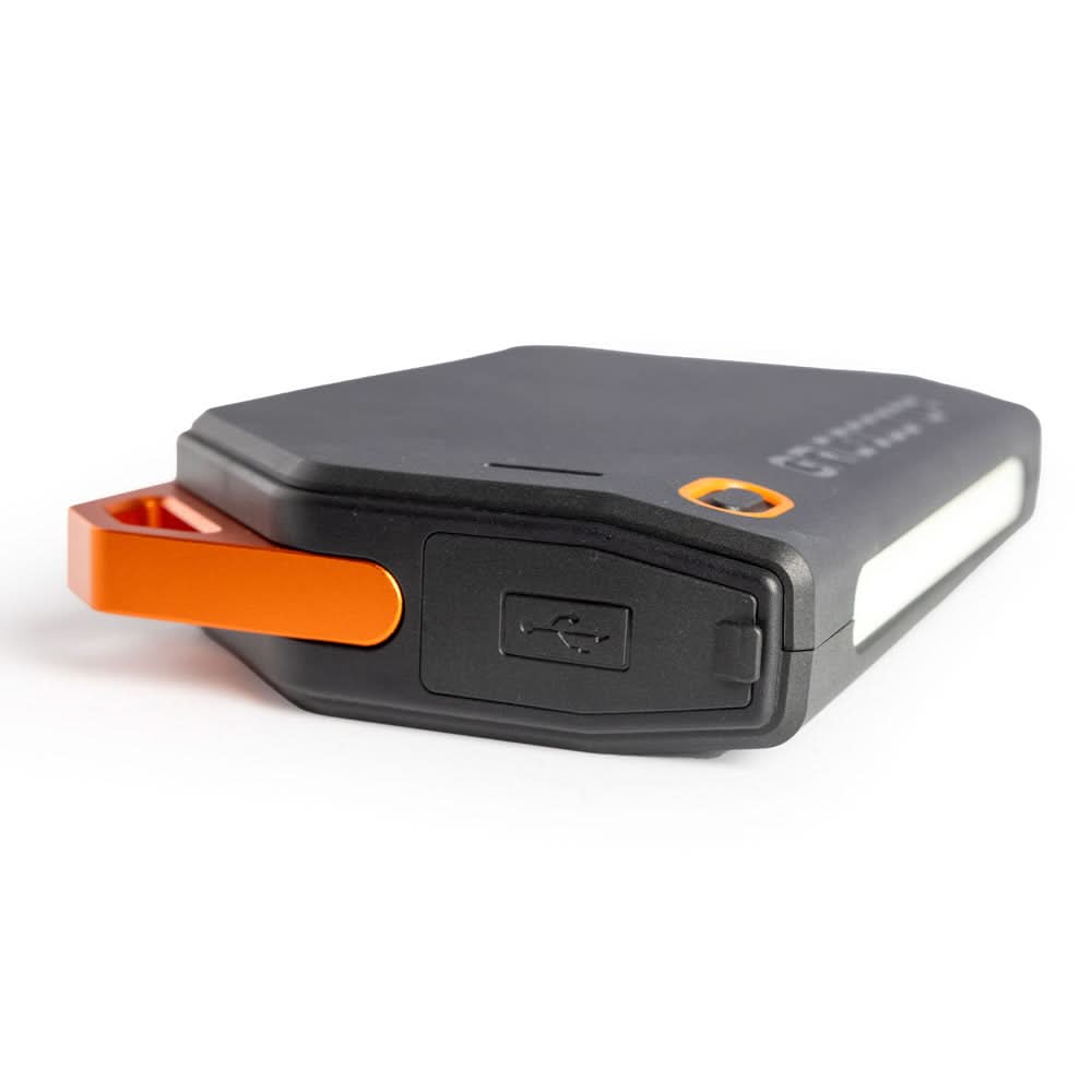 Side view of Grid Doctor 65W Power Bank with covered USB port and LED light