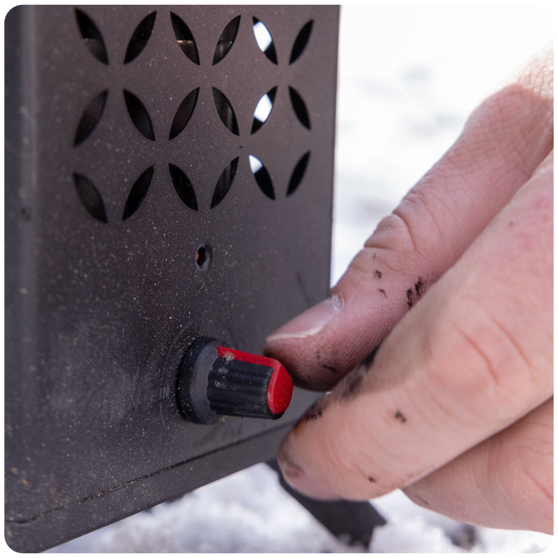 Adjusting the temperature dial of the Inferno Pro