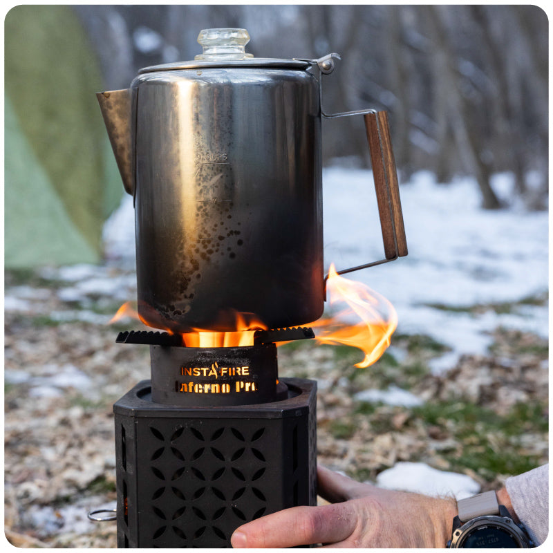 A stainless steel coffee pot heating up on the Inferno Pro