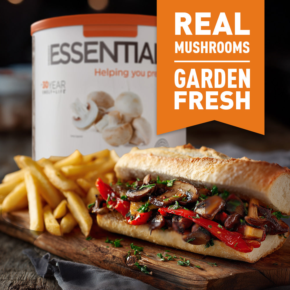 Sub sandwich with mushrooms and fries on a wooden board