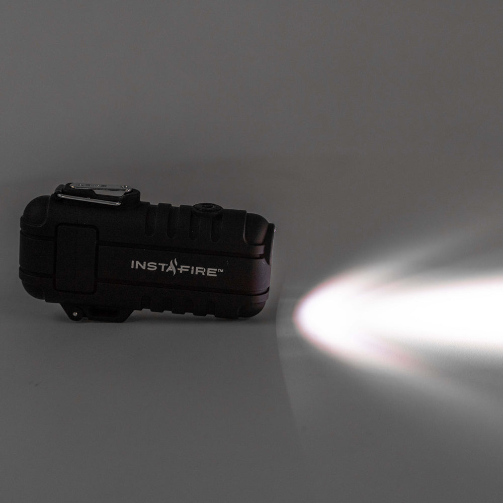 Focused beam of Pocket Plasma Lighter by InstaFire in a dark setting.