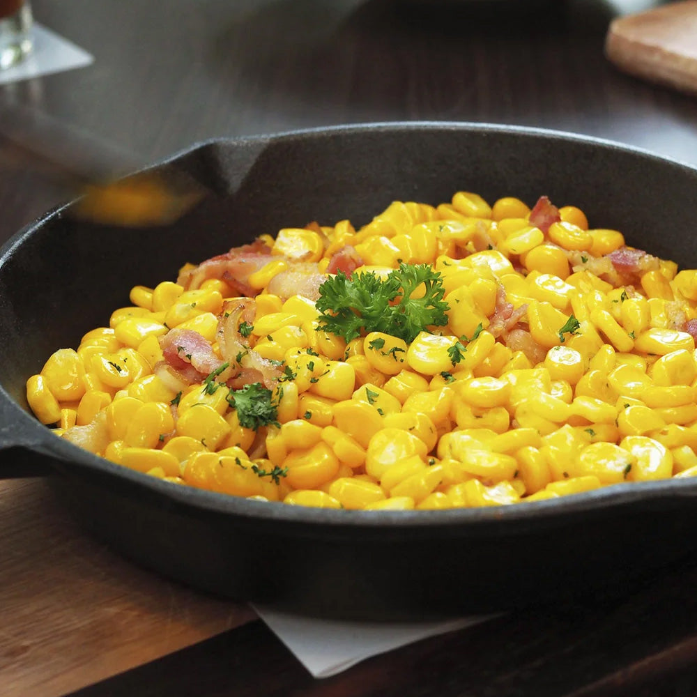 Prepared whole kernel sweet corn served in a skillet