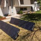 2 200w solar panels leading to a Grid Doctor 300 powering a home inside